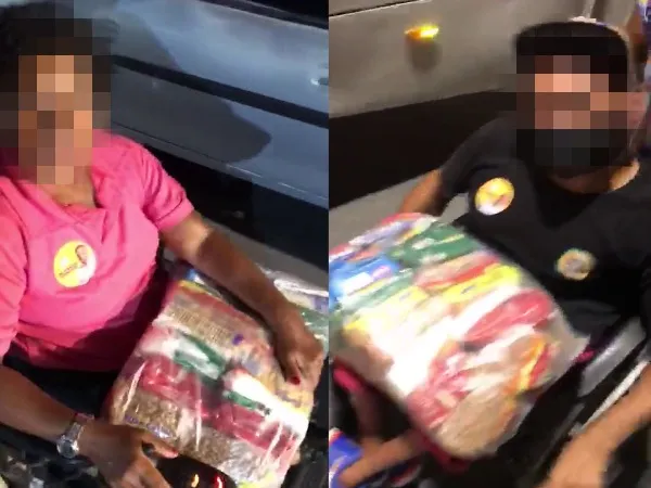 Com botons do candidato de Renan Filho e Rui presos ao corpo, cadeirantes saíram do local com cestas básicas
