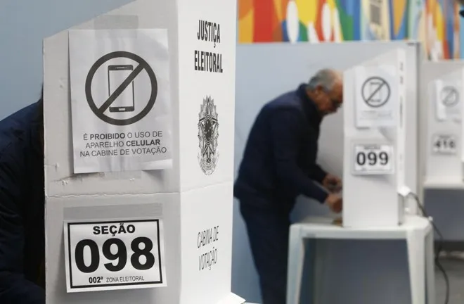 Imagem ilustrativa da imagem TSE VETA PORTE DE ARMA PERTO DE SEÇÕES ELEITORAIS NO DIA VOTAÇÃO