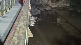 Fuga após furto em lotérica acaba com carro em rio, um morto e perda de R$ 70 mil