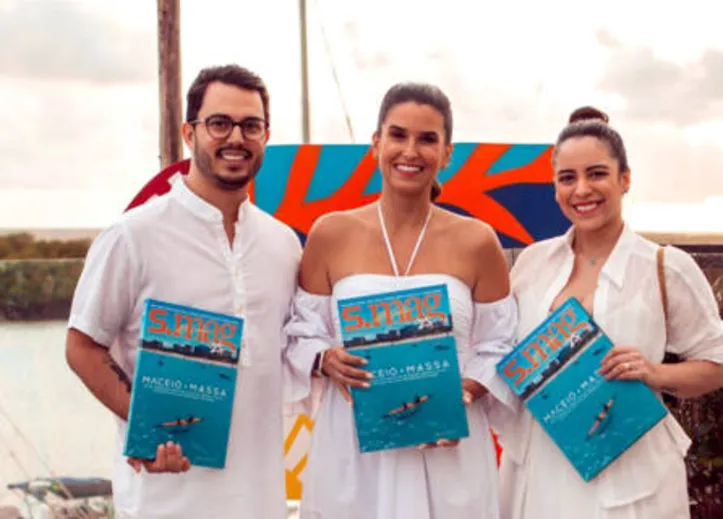 O sushichef YURI ROCHA e sua partner ELOUYSI entre os convidados da SMag