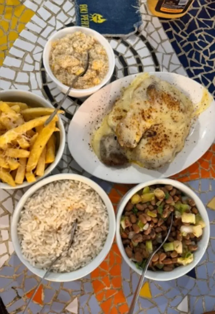 Imagem ilustrativa da imagem Aki Perto: petiscos caprichados e um dos melhores cordeiros guisados